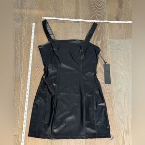Noli Sleek Black Mini Dress